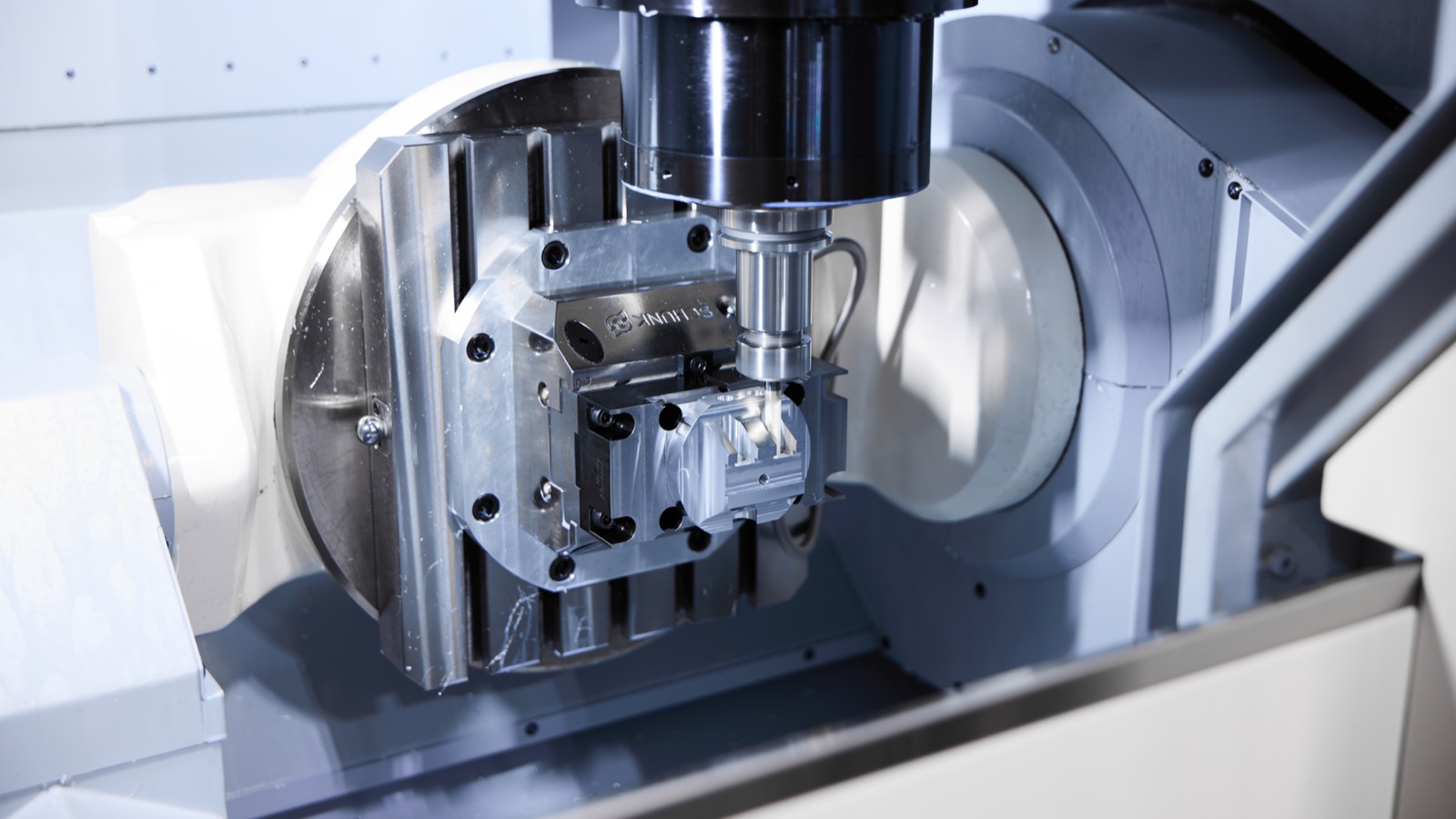Precision machining of a metal part on the shop floor